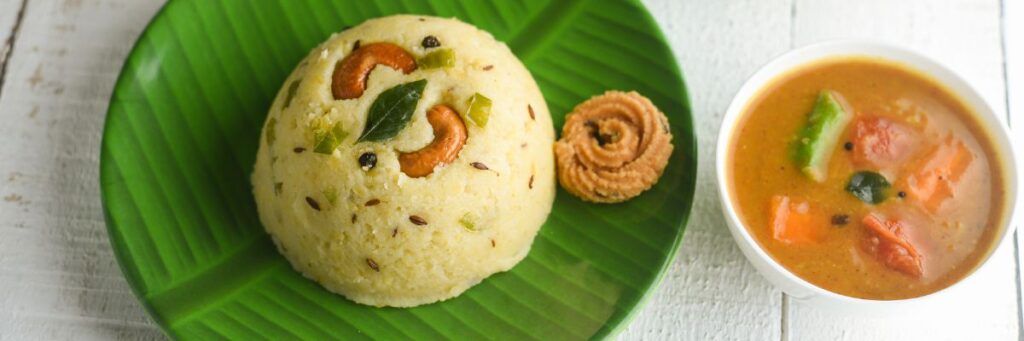 South Indian breakfast upma served with sambar and chutney on a banana leaf plate – healthy Indian breakfast ideas
