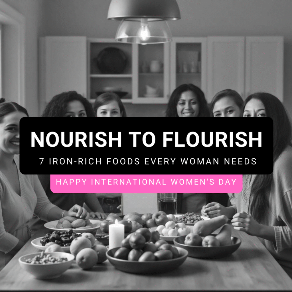 A diverse group of women of different ages and ethnicities gathered in a bright kitchen, smiling and enjoying a table full of iron-rich foods including spinach, lentils, tofu, quinoa, pumpkin seeds, chickpeas, and dark chocolate. Natural light fills the room, and a small “Happy Women’s Day” sign is visible. Text overlay on a mauve banner reads: "NOURISH TO FLOURISH – 7 Iron-Rich Foods Every Woman Needs on International Women’s Day.