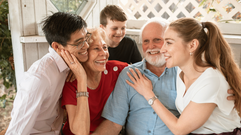 a group of people smiling and hugging