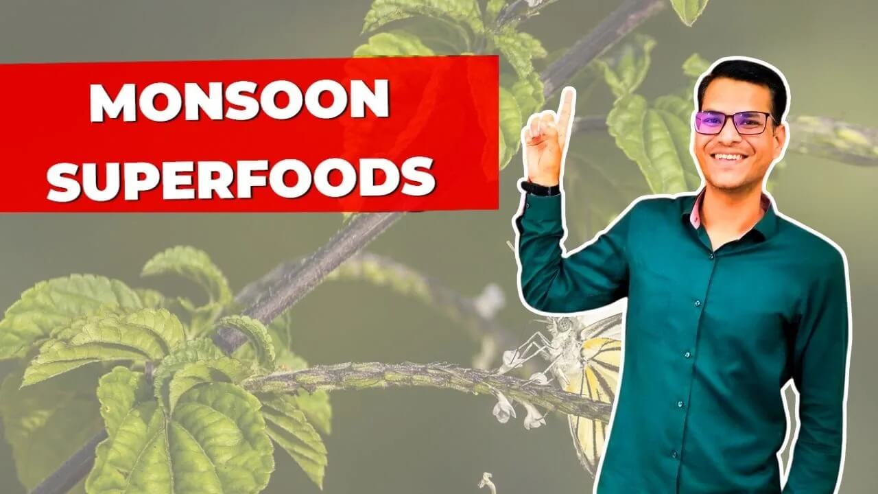 Anup Agharwal smiling and pointing upward next to bold red text reading "Monsoon Superfoods", with a herbal leaf background.